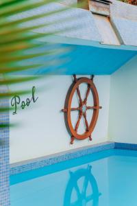 a picture of a boat in a swimming pool at Edelwyss-Inn in Morogoro