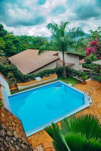 an overhead view of a swimming pool in a resort at Edelwyss-Inn in Morogoro