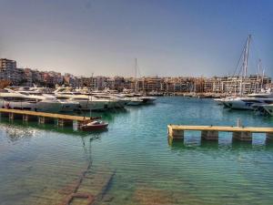 a group of boats docked in a marina at Piraeus Blue Grand Suite di Giorgio 10 mins from the port. in Piraeus