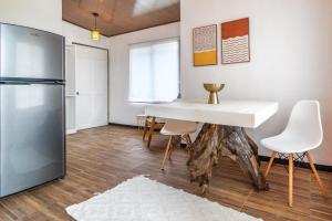 Kuchyň nebo kuchyňský kout v ubytování BUDDA HOME