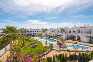 an aerial view of the pool at a resort at Tortuga Marina in San Juan de los Terreros