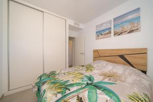 a bedroom with a bed with a plant on it at Tortuga Marina in San Juan de los Terreros +42 photos