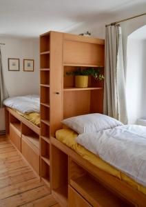 Postel nebo postele na pokoji v ubytování Karlštejn 34