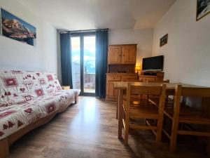 TV a/nebo společenská místnost v ubytování Résidence Doris - maeva Home - Studio 4 Personnes - Confort MAE-3910 + 16 fotografií