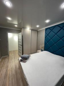 Postel nebo postele na pokoji v ubytování Отличная двушка в центре Темиртау