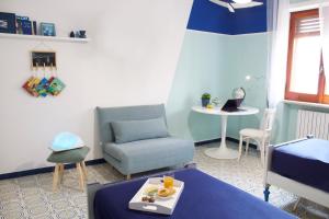 A bed or beds in a room at Casa Derosa in Sorrento Centro