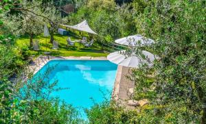 A view of the pool at One bedroom house with city view private pool and garden at Monte San Savino or nearby