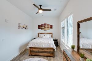 a bedroom with a bed and a ceiling fan at Nashville Condo, 3 Mi to Downtown Entertainment in Nashville