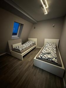 Postel nebo postele na pokoji v ubytování Angi-Appartments