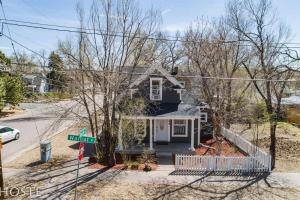 a house on the corner of a street at 3BR Charming Modern Victorian Home Downtown in Colorado Springs