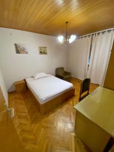 Postel nebo postele na pokoji v ubytování ANA