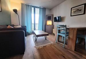 Μια τηλεόραση ή/και κέντρο ψυχαγωγίας στο Résidence Sirius - maeva Home - Studio 4 personnes - Confort MAE-3534