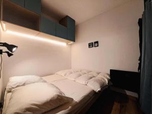 Ένα ή περισσότερα κρεβάτια σε δωμάτιο στο Résidence Sirius - maeva Home - Studio 4 personnes - Confort MAE-3534