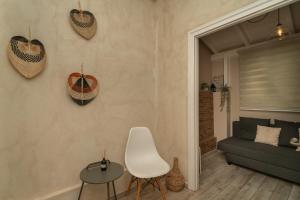 Posezení v ubytování Maisonette Pylos
