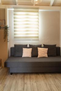 Posezení v ubytování Maisonette Pylos
