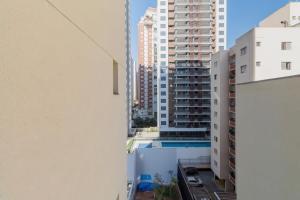 a view from the balcony of a building with buildings at BHomy Perdizes Ideal para 4 hóspedes DH306 in Sao Paulo