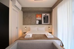 Кровать или кровати в номере BHomy Pinheiros - Varanda ampla com vista VT320
