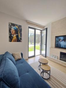 En TV eller et underholdningssystem på Apartman Silvija Divčibare