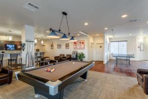 a living room with a pool table in it at 3Bdrm Apartment 2 Blocks Away from UNC with Gym in Greeley