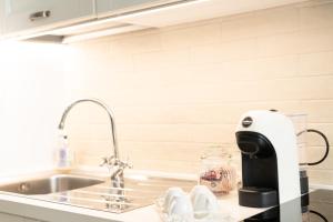 Coffee and tea making facilities at Casa vacanze La Scala d'Oro