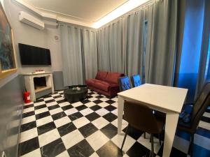 a living room with a checkered floor at Esposizione Roof in Rome
