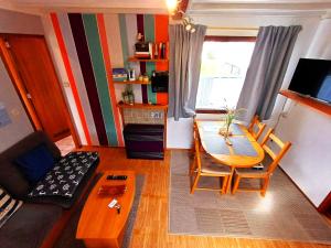 TV a/nebo společenská místnost v ubytování StrandChalet