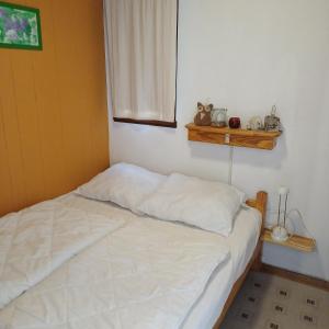 Postel nebo postele na pokoji v ubytování StrandChalet