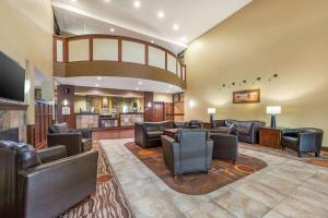 a large lobby with leather chairs and a waiting room at Best Western Plus Grand Island Inn and Suites in Grand Island