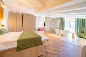 Hotel Millennium by Aycon客房内的一张或多张床位