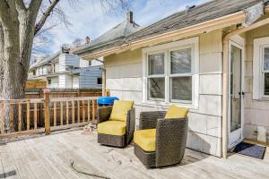 a patio with two chairs and a house at Close to Hospital Dining & Notre Dame in South Bend