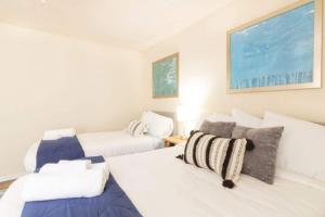 Postelja oz. postelje v sobi nastanitve The Delightful Doubles- Unit A- Centrally Located