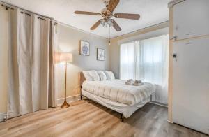 A bed or beds in a room at Near Shopping & Dining- Magic in Midtown- Unit B