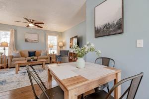 a living room with a wooden table and chairs at Close to USC & Midtown-Downtown - Newly Renovated in Columbia