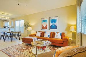 a living room with a couch and a table at Nightsky Nest ※ Desert Getaway by Joshua Tree Park in Twentynine Palms
