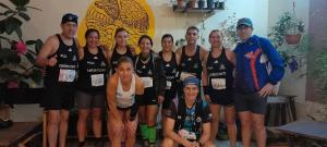 a group of people posing for a picture at a race at Ruda Hostel in Buenos Aires