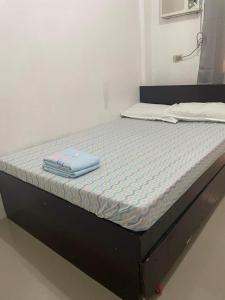 Postel nebo postele na pokoji v ubytování Dannykaela Transient House