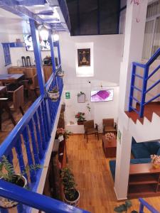 a view from the top of a building with stairs at El Ave Azul Boutique Hotel Cusco in Cusco