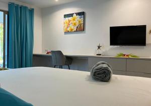 TV a/nebo společenská místnost v ubytování Mareta Lodge - Studio MAHA 4