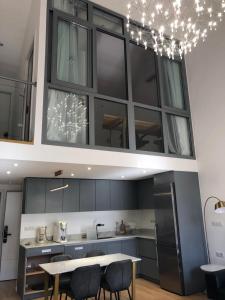 Billede fra billedgalleriet på Appartement d'architecte en extra centre de Saint Denis i Saint-Denis