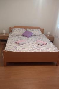Ένα ή περισσότερα κρεβάτια σε δωμάτιο στο Apartments and rooms by the sea Zdrelac, Pasman - 22802