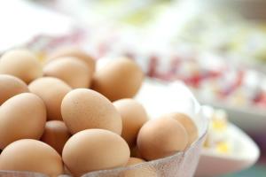 a bunch of brown eggs in a glass bowl at Holiday Inn Express Zürich Airport by IHG in Rümlang