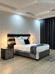 Un pat sau paturi într-o cameră la holiday villa