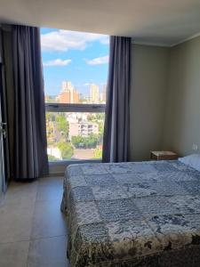 Katil atau katil-katil dalam bilik di Departamento nuevo 2 habitaciones 2 baños y balcón 95m2 Piso alto sobre la costanera