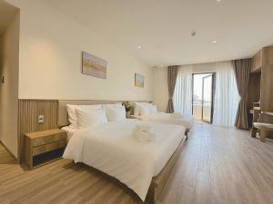 Katil atau katil-katil dalam bilik di Túi Ba Gang Central Hotel