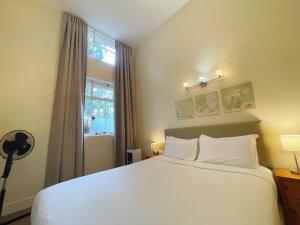Postel nebo postele na pokoji v ubytování Grand Central Serviced Apartments