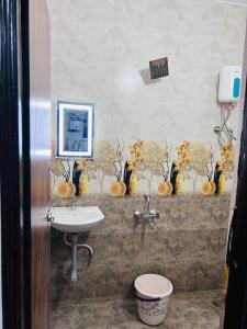 a bathroom with a sink and a toilet at 1BHK Holiday Home in Nagpur