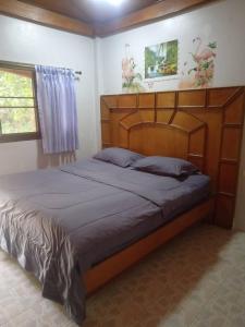 Ένα ή περισσότερα κρεβάτια σε δωμάτιο στο Maleeya garden guest house