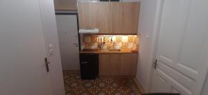 a small kitchen with a sink and a counter at Vintage house in Athens