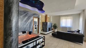 Kuchyň nebo kuchyňský kout v ubytování Blue Hole b&b Santeramo in colle e Jacuzzi Suite