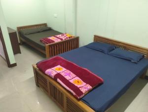 Ein Bett oder Betten in einem Zimmer der Unterkunft Chikkoose lodge
